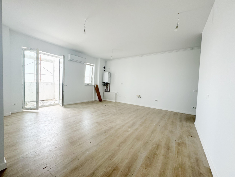 Apartament 3 camere, open space, 67 mp utili, etaj 6/9, zona Aradului